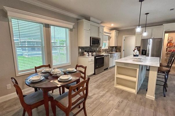 Dining room, Interior, Kitchen, Pendant Lights, Recessed Lighting, Stainless Steel Appliances, Wood Texture Flooring