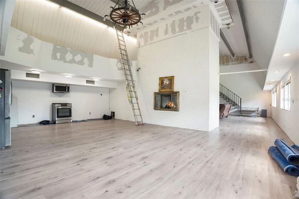 Fireplace, Interior, Pendant Lights, Recessed Lighting, Wood Texture Flooring