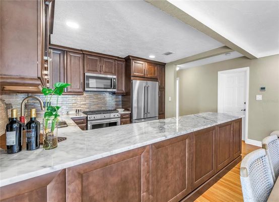Interior, Kitchen, Recessed Lighting, Stainless Steel Appliances, Wood Texture Flooring
