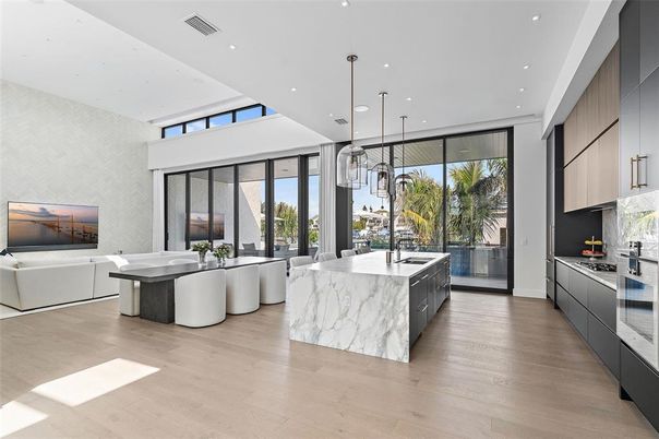 Dining room, Interior, Kitchen, Living room, Pendant Lights, Recessed Lighting, Stainless Steel Appliances, Wood Texture Flooring