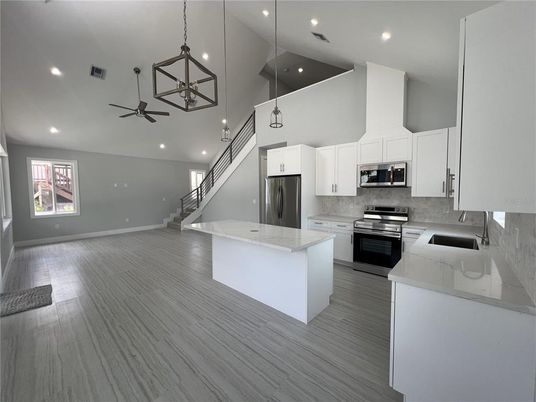 Interior, Kitchen, Pendant Lights, Recessed Lighting, Stainless Steel Appliances, Wood Texture Flooring