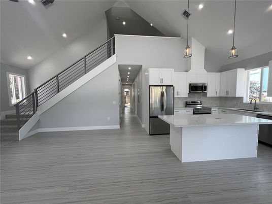 Interior, Kitchen, Pendant Lights, Recessed Lighting, Stainless Steel Appliances, Wood Texture Flooring
