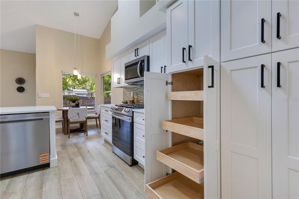 Dining room, Interior, Kitchen, Pendant Lights, Stainless Steel Appliances, Wood Texture Flooring