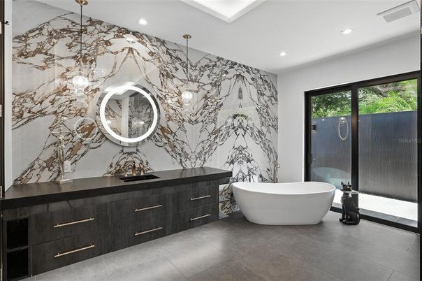 Bathroom, Dual Sink Vanities, Free Standing Baths, Interior, Marble Walls, Recessed Lighting