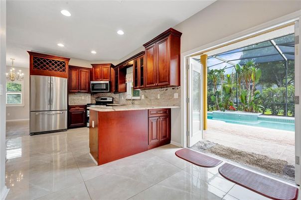 Chandelier, Interior, Kitchen, Pool, Recessed Lighting, Stainless Steel Appliances