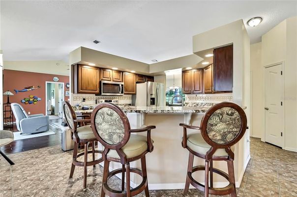 Dining room, Interior, Kitchen, Recessed Lighting, Stainless Steel Appliances, Wood Texture Flooring