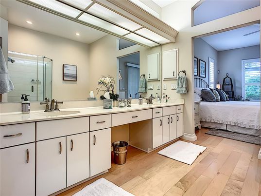 Bathroom, Bedroom, Dual Sink Vanities, Glass Shower, Interior, Recessed Lighting, Wood Texture Flooring