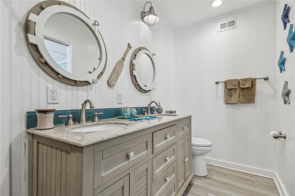 Bathroom, Dual Sink Vanities, Interior, Recessed Lighting, Wood Texture Flooring