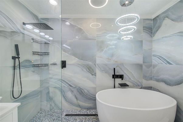 Bathroom, Free Standing Baths, Glass Shower, Interior, Marble Walls, Pendant Lights, Recessed Lighting