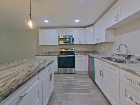 Interior, Kitchen, Pendant Lights, Recessed Lighting, Stainless Steel Appliances, Wood Texture Flooring