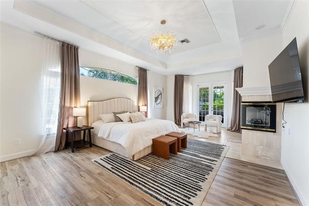 Bedroom, Chandelier, Fireplace, Interior, Wood Texture Flooring