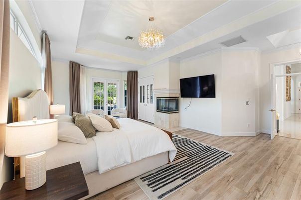 Bedroom, Chandelier, Fireplace, Interior, Wood Texture Flooring