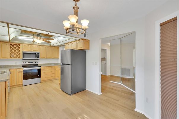 Chandelier, Interior, Kitchen, Stainless Steel Appliances, Wood Texture Flooring