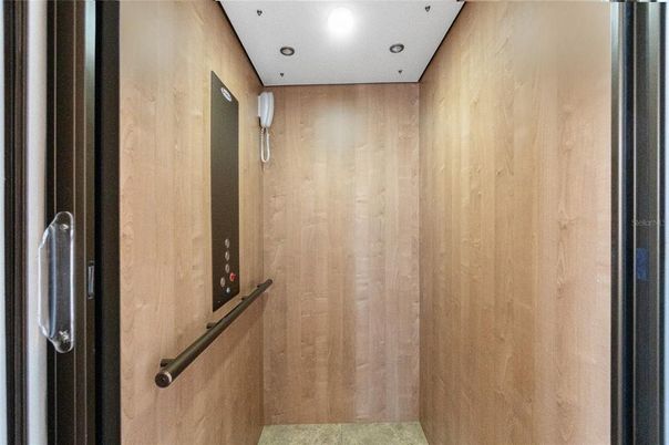 Elevator, Interior, Recessed Lighting, Wooden Walls