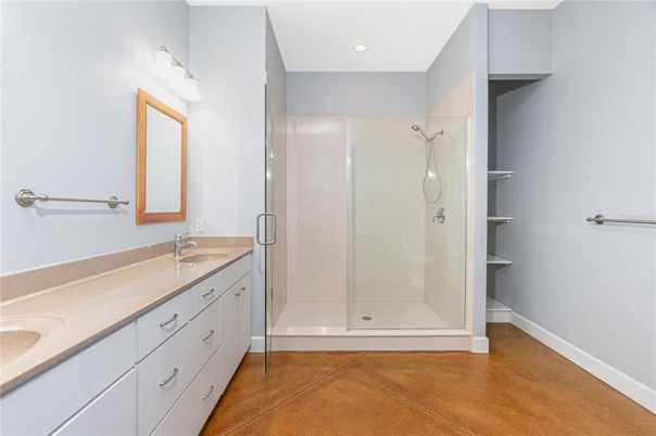 Bathroom, Dual Sink Vanities, Glass Shower, Interior, Recessed Lighting, Wood Texture Flooring