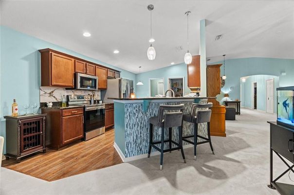 Interior, Kitchen, Pendant Lights, Recessed Lighting, Stainless Steel Appliances, Wood Texture Flooring