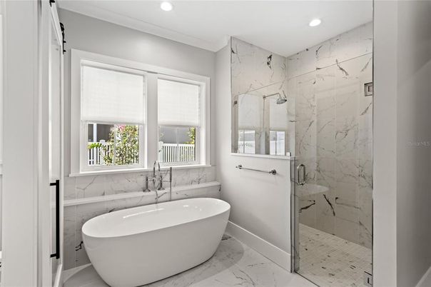 Bathroom, Free Standing Baths, Glass Shower, Interior, Marble, Marble Walls, Recessed Lighting