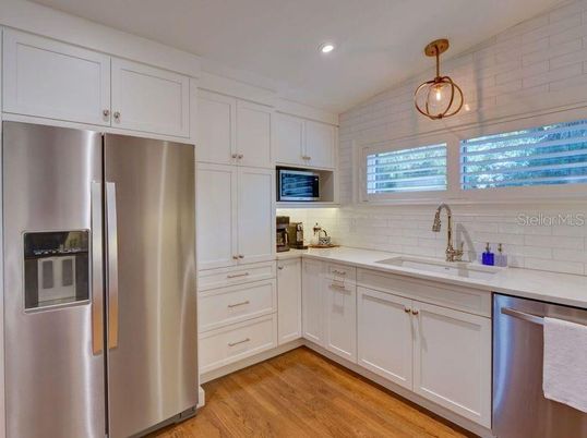 Interior, Kitchen, Pendant Lights, Recessed Lighting, Stainless Steel Appliances, Wood Texture Flooring