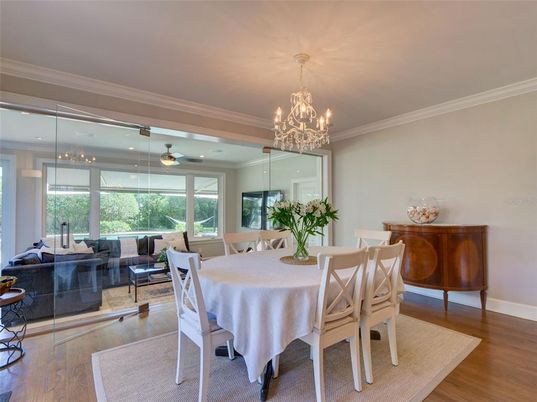 Chandelier, Dining room, Interior, Living room, Piano, Recessed Lighting, Wood Texture Flooring