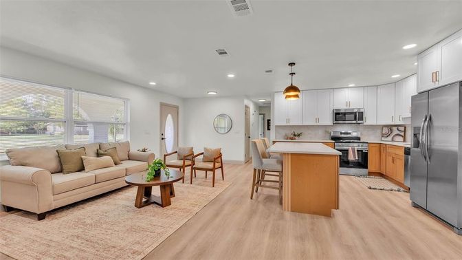 Dining room, Interior, Kitchen, Living room, Pendant Lights, Recessed Lighting, Stainless Steel Appliances, Wood Texture Flooring