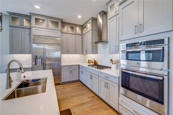 Interior, Kitchen, Recessed Lighting, Stainless Steel Appliances, Wood Texture Flooring