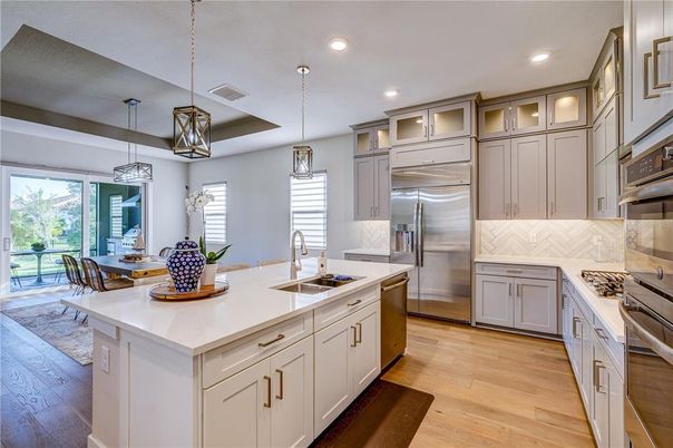 Dining room, Interior, Kitchen, Pendant Lights, Recessed Lighting, Stainless Steel Appliances, Wood Texture Flooring