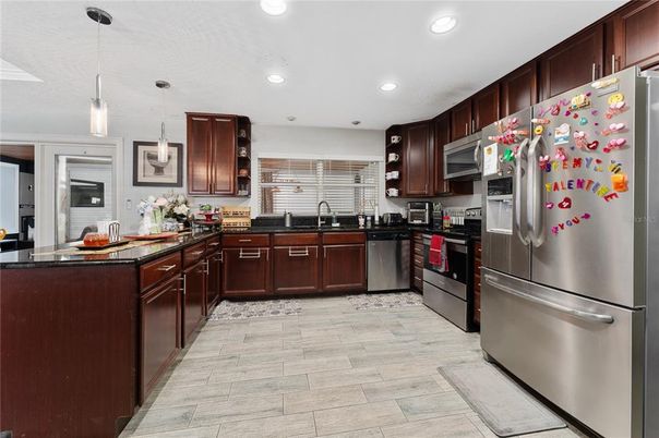 Interior, Kitchen, Pendant Lights, Recessed Lighting, Stainless Steel Appliances, Wood Texture Flooring
