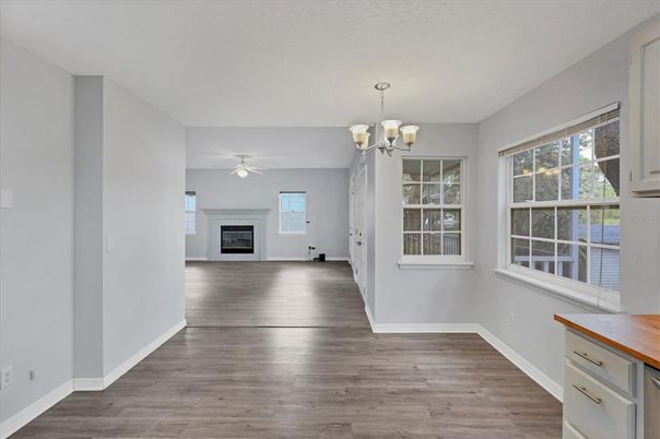 Chandelier, Empty room, Fireplace, Interior, Wood Texture Flooring