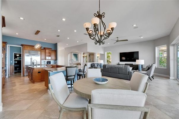 Chandelier, Dining room, Interior, Kitchen, Living room, Pendant Lights, Recessed Lighting, Stainless Steel Appliances
