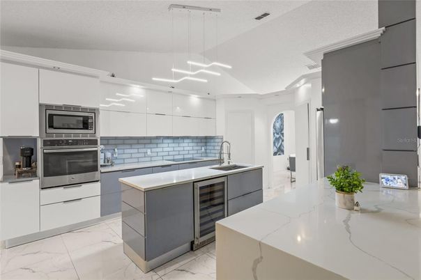 Interior, Kitchen, Marble, Pendant Lights, Recessed Lighting, Stainless Steel Appliances