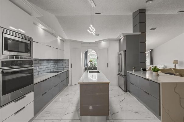 Interior, Kitchen, Marble, Pendant Lights, Recessed Lighting, Stainless Steel Appliances