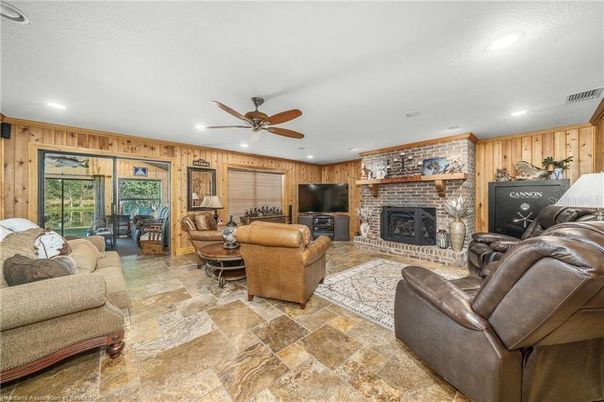 Fireplace, Interior, Living room, Recessed Lighting, Stone Walls, Wooden Walls