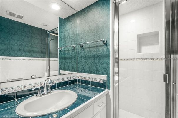 Bathroom, Glass Shower, Interior, Recessed Lighting, Tile Countertops