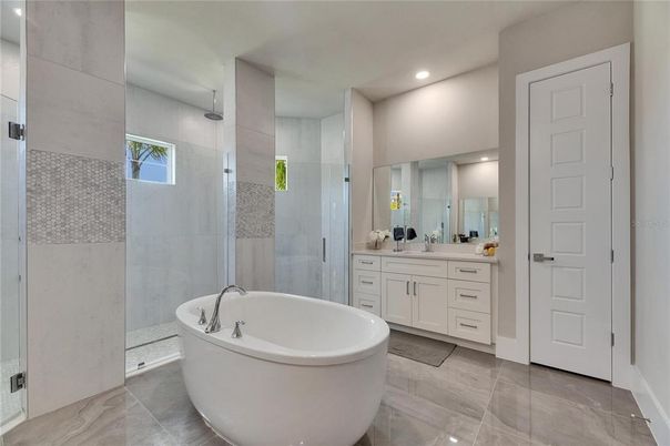 Bathroom, Dual Sink Vanities, Free Standing Baths, Glass Shower, Interior, Recessed Lighting