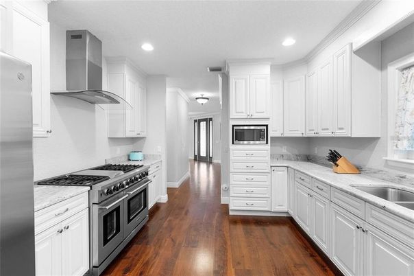 Interior, Kitchen, Recessed Lighting, Stainless Steel Appliances, Wood Texture Flooring