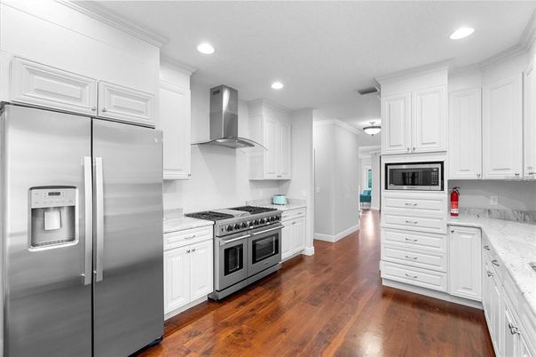 Interior, Kitchen, Recessed Lighting, Stainless Steel Appliances, Wood Texture Flooring