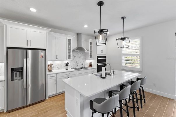 Interior, Kitchen, Pendant Lights, Recessed Lighting, Stainless Steel Appliances, Wood Texture Flooring