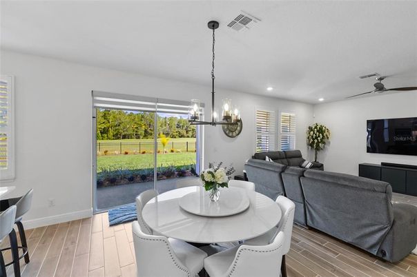 Chandelier, Dining room, Interior, Living room, Pendant Lights, Recessed Lighting, Wood Texture Flooring