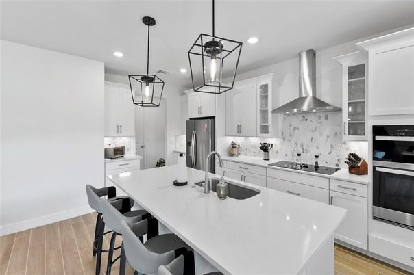 Interior, Kitchen, Pendant Lights, Recessed Lighting, Stainless Steel Appliances, Wood Texture Flooring