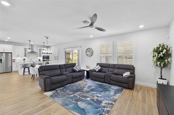 Dining room, Interior, Kitchen, Living room, Pendant Lights, Recessed Lighting, Stainless Steel Appliances, Wood Texture Flooring