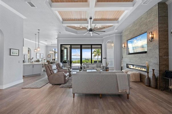 Fireplace, Interior, Living room, Pendant Lights, Stone Walls, Wood Texture Flooring