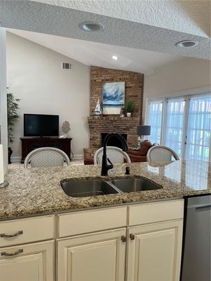 Fireplace, Interior, Kitchen, Recessed Lighting, Stone Walls