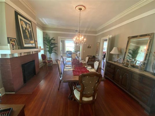 Chandelier, Dining room, Fireplace, Interior, Wood Texture Flooring