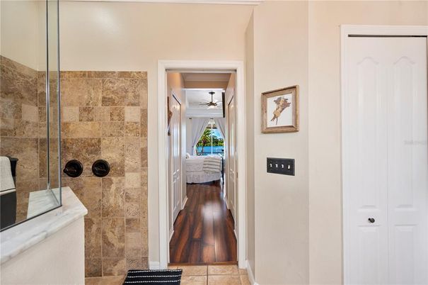 Bathroom, Glass Shower, Interior, Stone Walls, Wood Texture Flooring