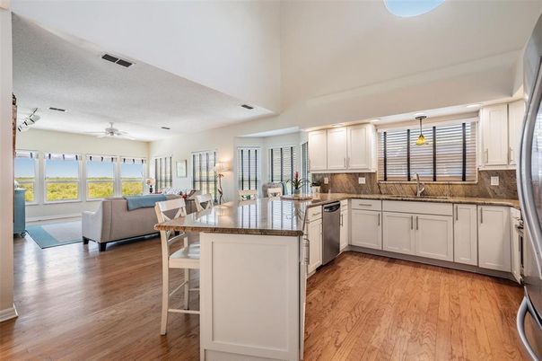 Dining room, Interior, Kitchen, Living room, Pendant Lights, Stainless Steel Appliances, Wood Texture Flooring