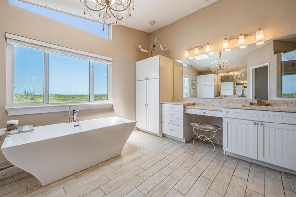 Bathroom, Chandelier, Free Standing Baths, Interior, Wood Texture Flooring