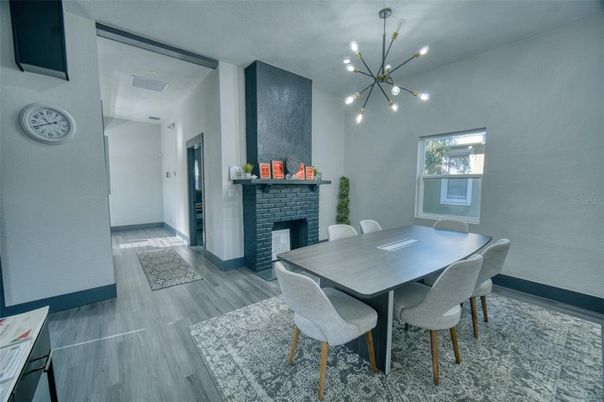 Dining room, Fireplace, Interior, Pendant Lights, Wood Texture Flooring