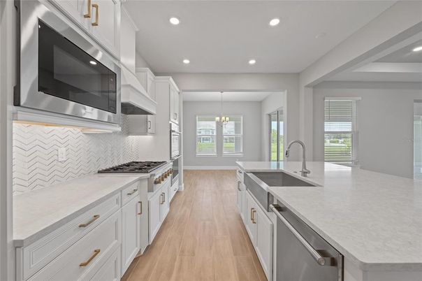Chandelier, Interior, Kitchen, Recessed Lighting, Stainless Steel Appliances, Wood Texture Flooring