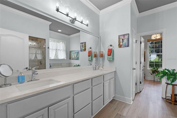 Bathroom, Dual Sink Vanities, Glass Shower, Interior, Recessed Lighting, Wood Texture Flooring