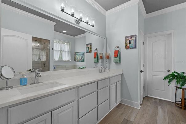 Bathroom, Dual Sink Vanities, Glass Shower, Interior, Recessed Lighting, Wood Texture Flooring